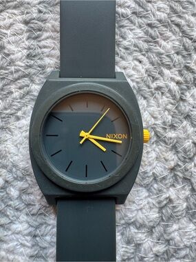 Nixon Minimal Time Teller Charcoal Watch with Yellow Accents.